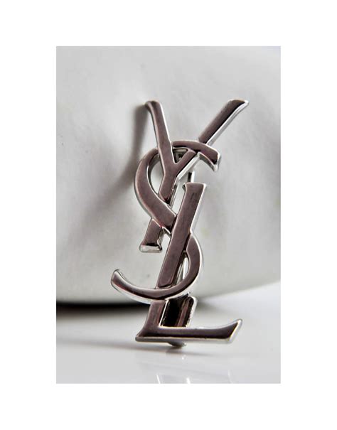 ysl broche logo .